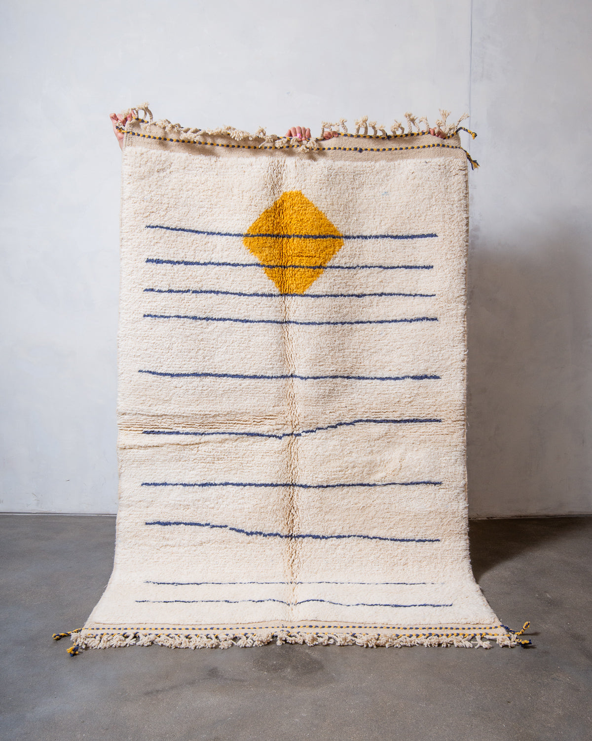 Modern, designer, handcrafted Berber rug from Morocco. Beniourain carpet with beautiful colours and patterns and fluffy wool texture.
